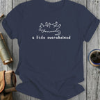 Navy t-shirt with white line drawing of a mouse rolling and text, "a little overwhelmed."