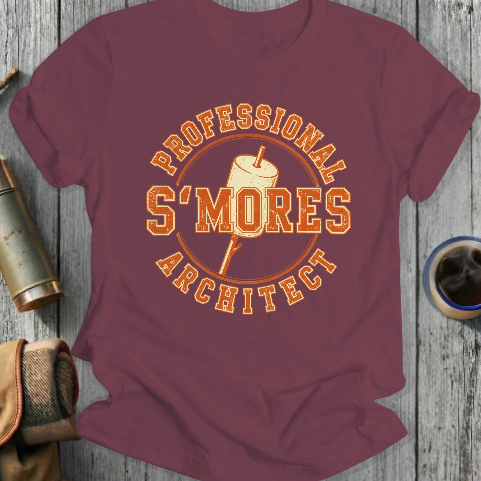 Burgundy t-shirt with "Professional S'mores Architect" text and marshmallow graphic.