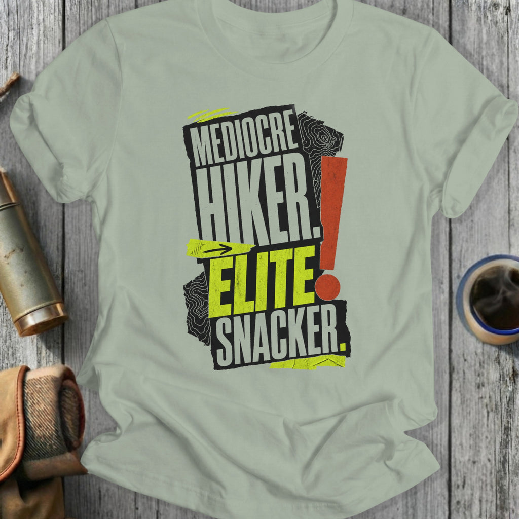 Light grey t-shirt with "Mediocre Hiker, Elite Snacker" graphic.