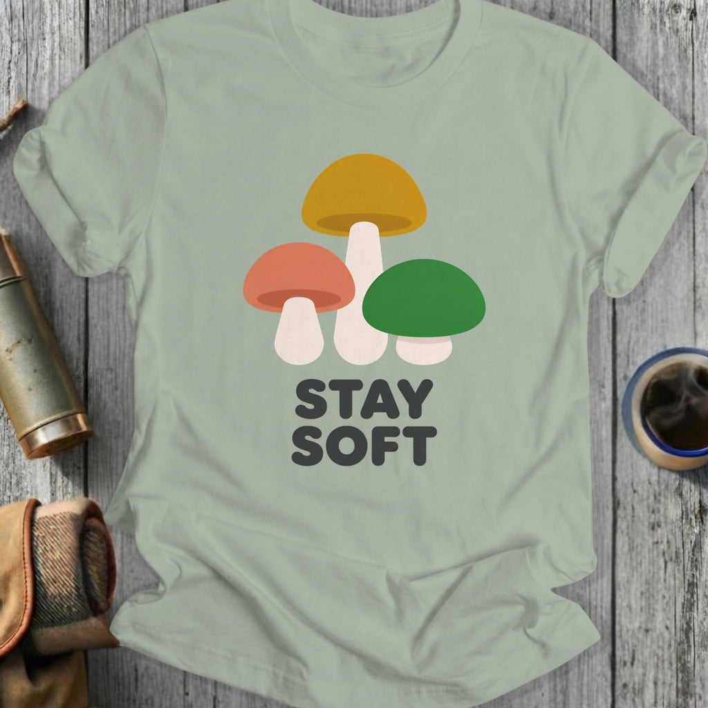 T-shirt with three cartoon mushrooms and "STAY SOFT" text.
