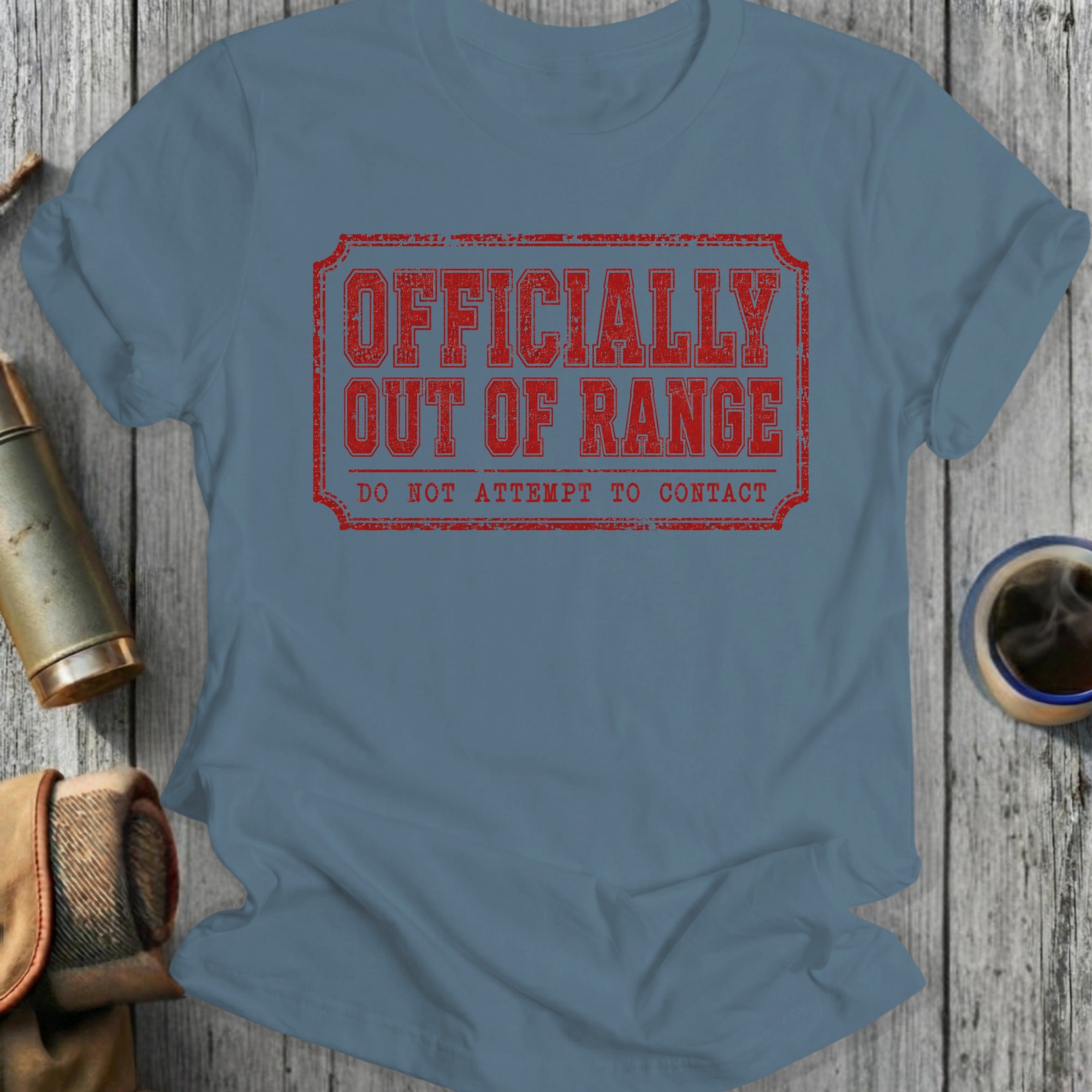 Blue t-shirt with red text "OFFICIALLY OUT OF RANGE DO NOT ATTEMPT TO CONTACT".