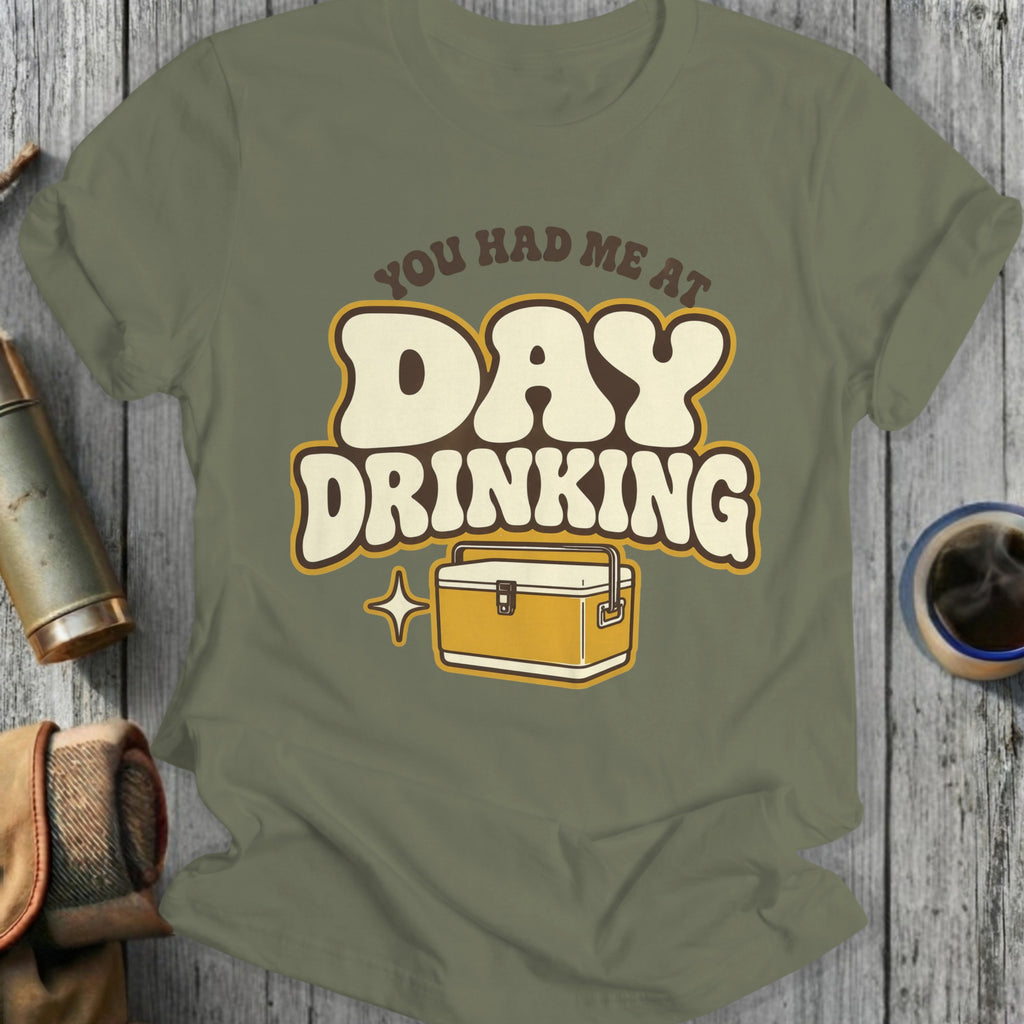 T-shirt with "You Had Me At Day Drinking" and a cooler graphic.