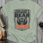 T-shirt with "You can't outrun a bear, always bring a slow friend" text and bear graphic.