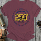 Maroon t-shirt with "United States 250th Hide & Seek Championship" and Bigfoot graphic.