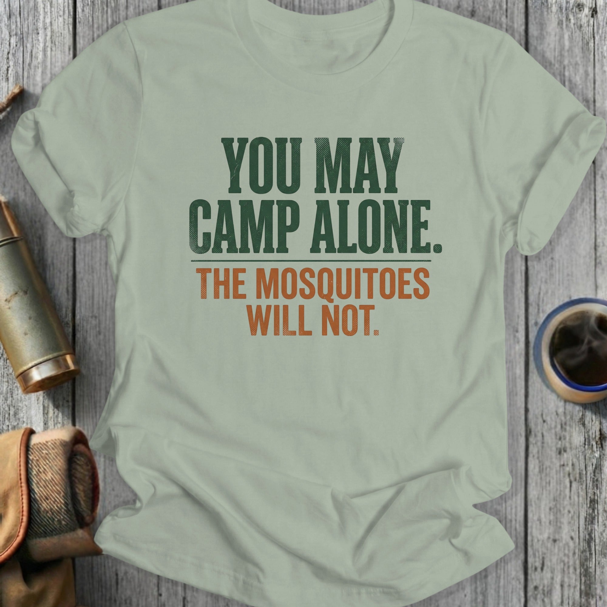 T-shirt with text "YOU MAY CAMP ALONE. THE MOSQUITOES WILL NOT."