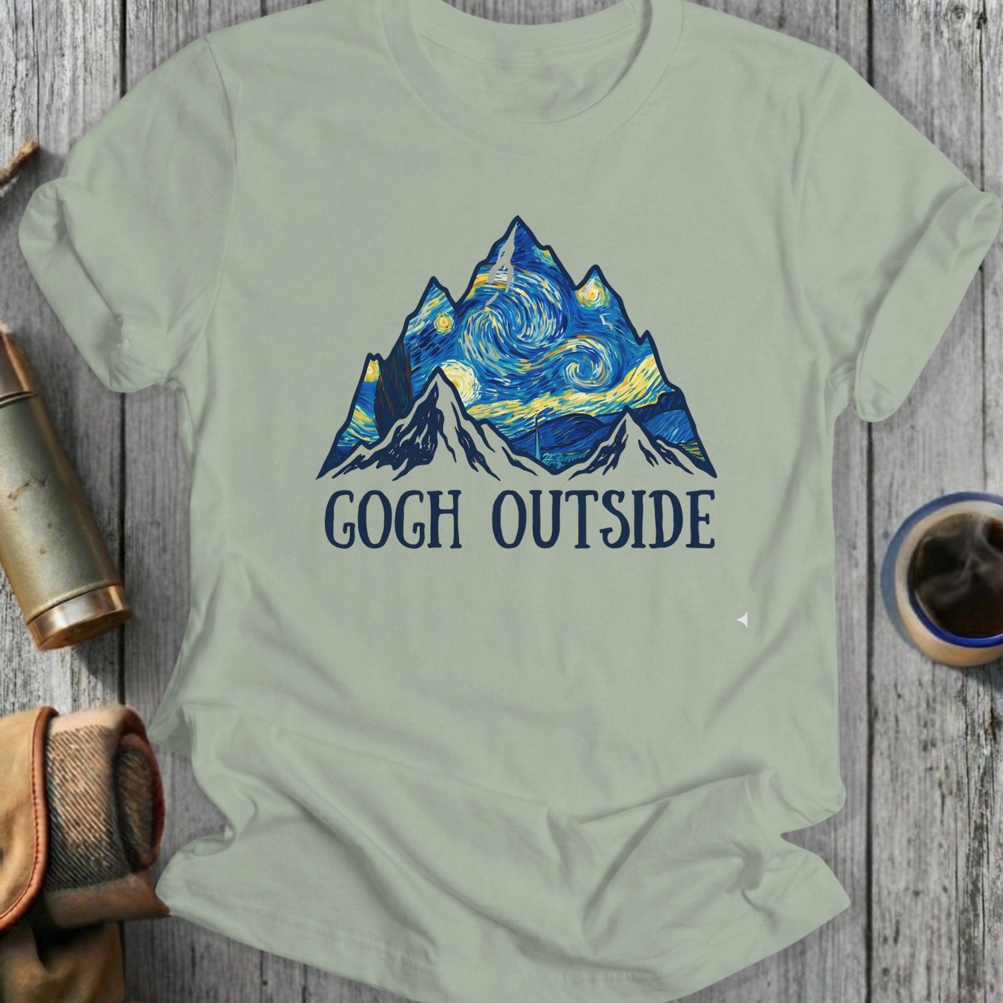 T-shirt with Van Gogh-inspired mountains and "Gogh Outside" text.
