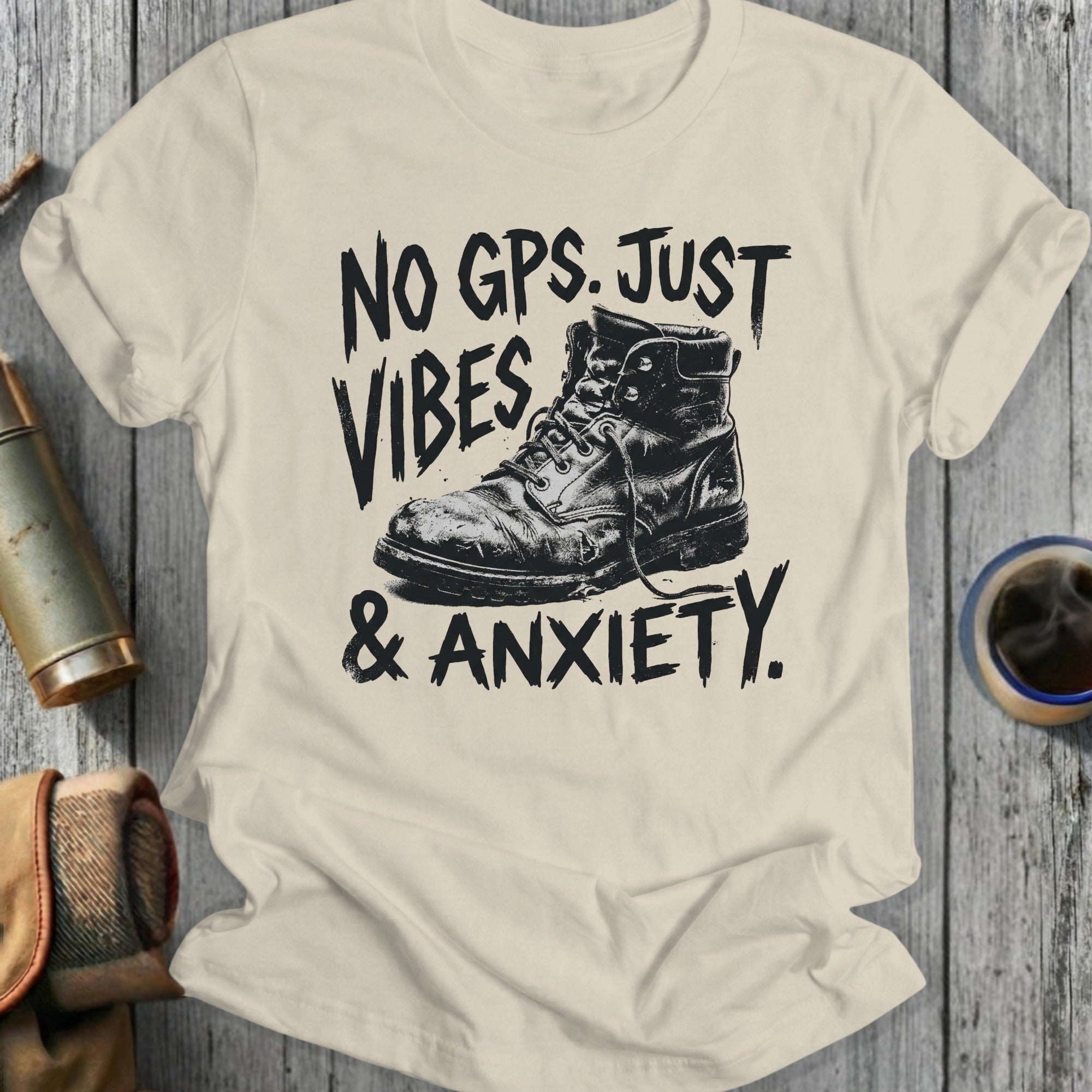 T-shirt with distressed boot and text "NO GPS. JUST VIBES & ANXIETY."