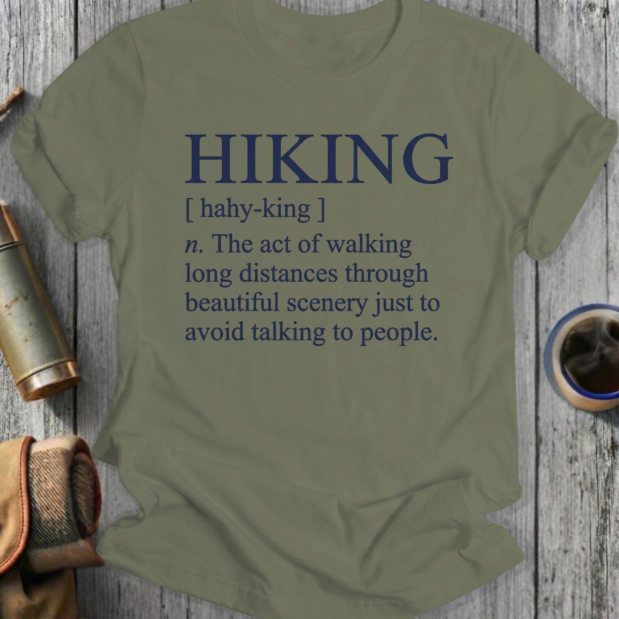 T-shirt with definition of "hiking" focusing on avoiding people.