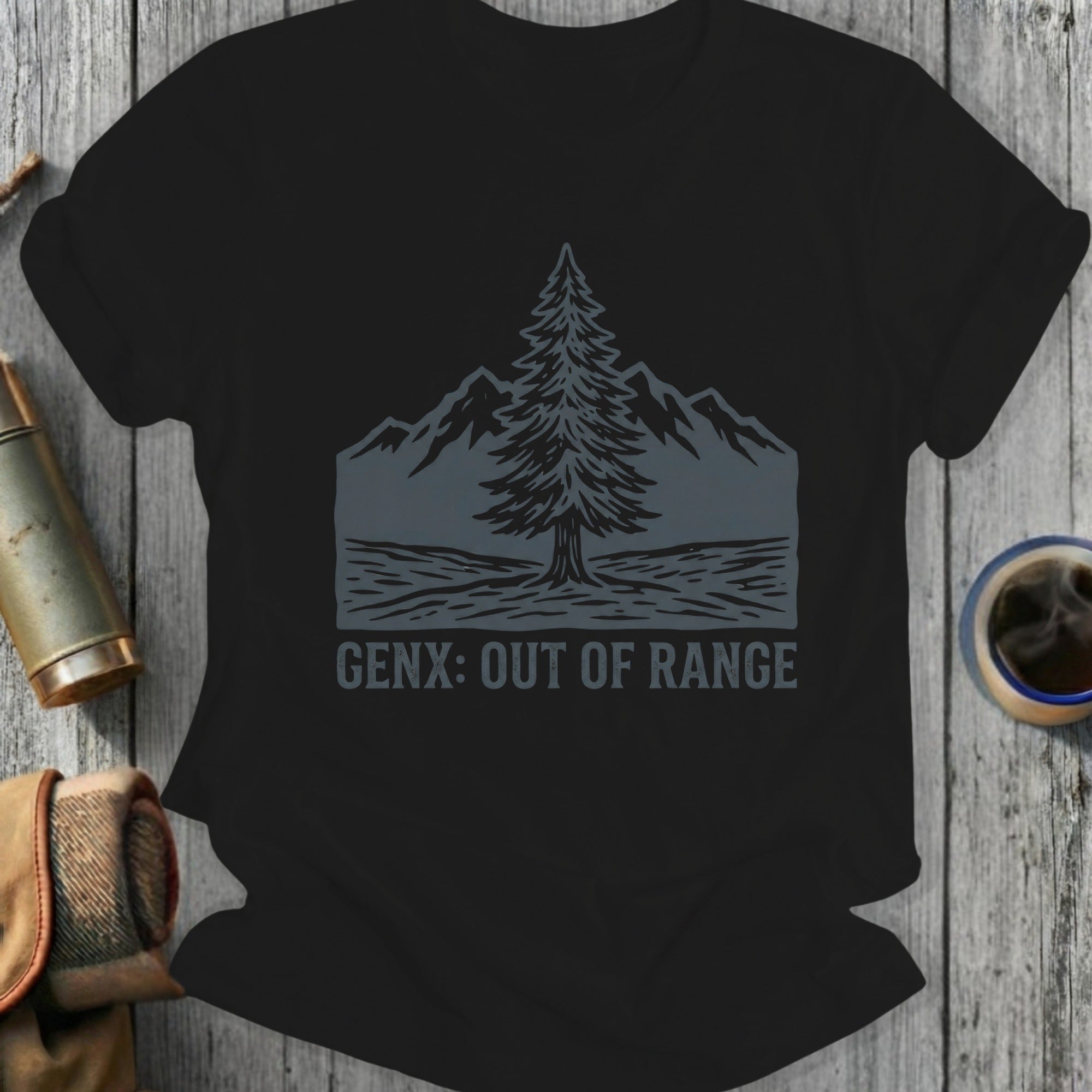 Black t-shirt with a pine tree, mountains, and "GEN X: OUT OF RANGE" text.