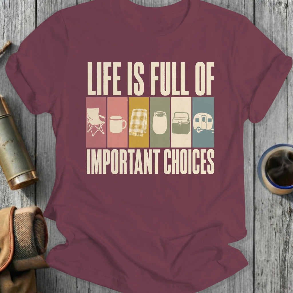 Maroon t-shirt with "Life is full of important choices" and camping icons.