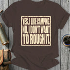 Brown t-shirt with "YES, I LIKE CAMPING, NO, I DON'T WANT TO ROUGH IT." text.