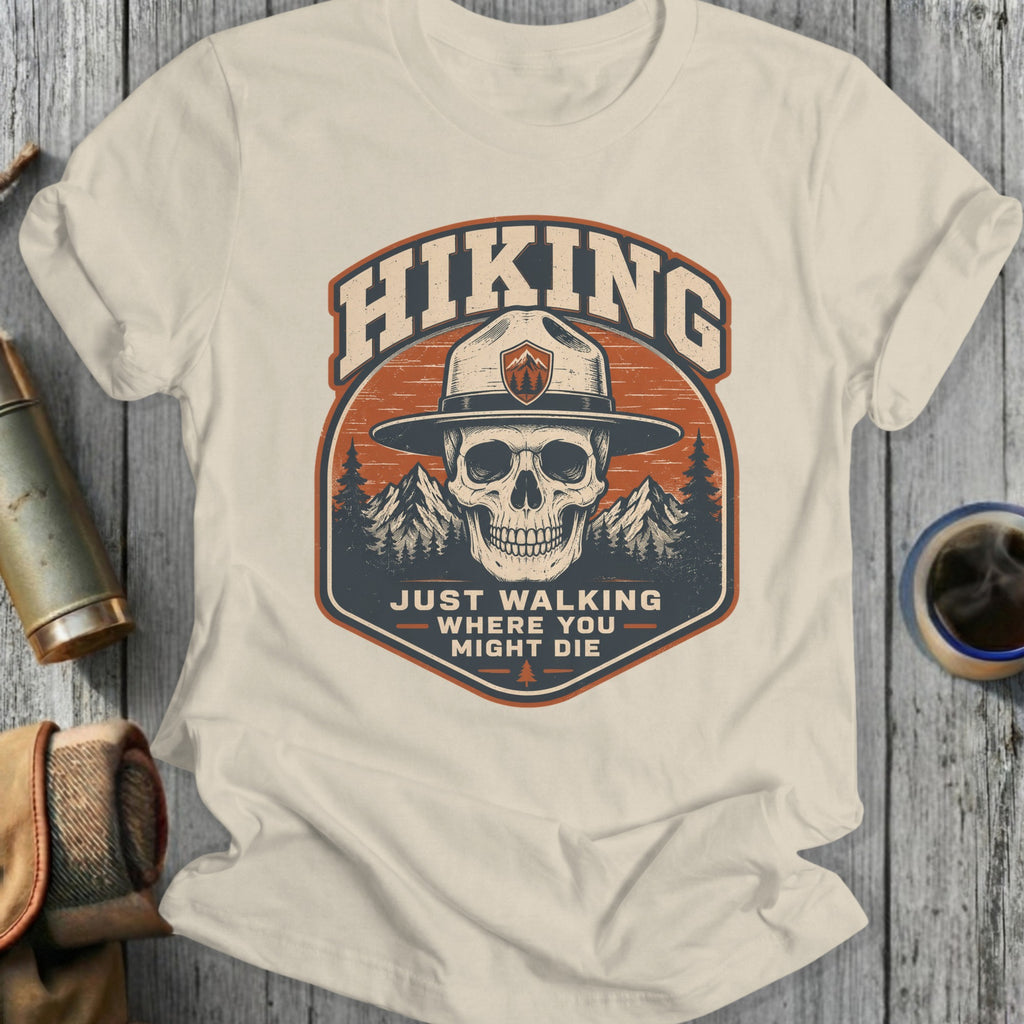 Hiking skull with compass logo and text "Just Walking Where You Might Die".