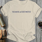 Light beige t-shirt with "PACK HIKE REGRET REPEAT" text and icons.
