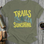 Olive t-shirt with "Chasing Trails & Sunshine" graphic and hiking boot.