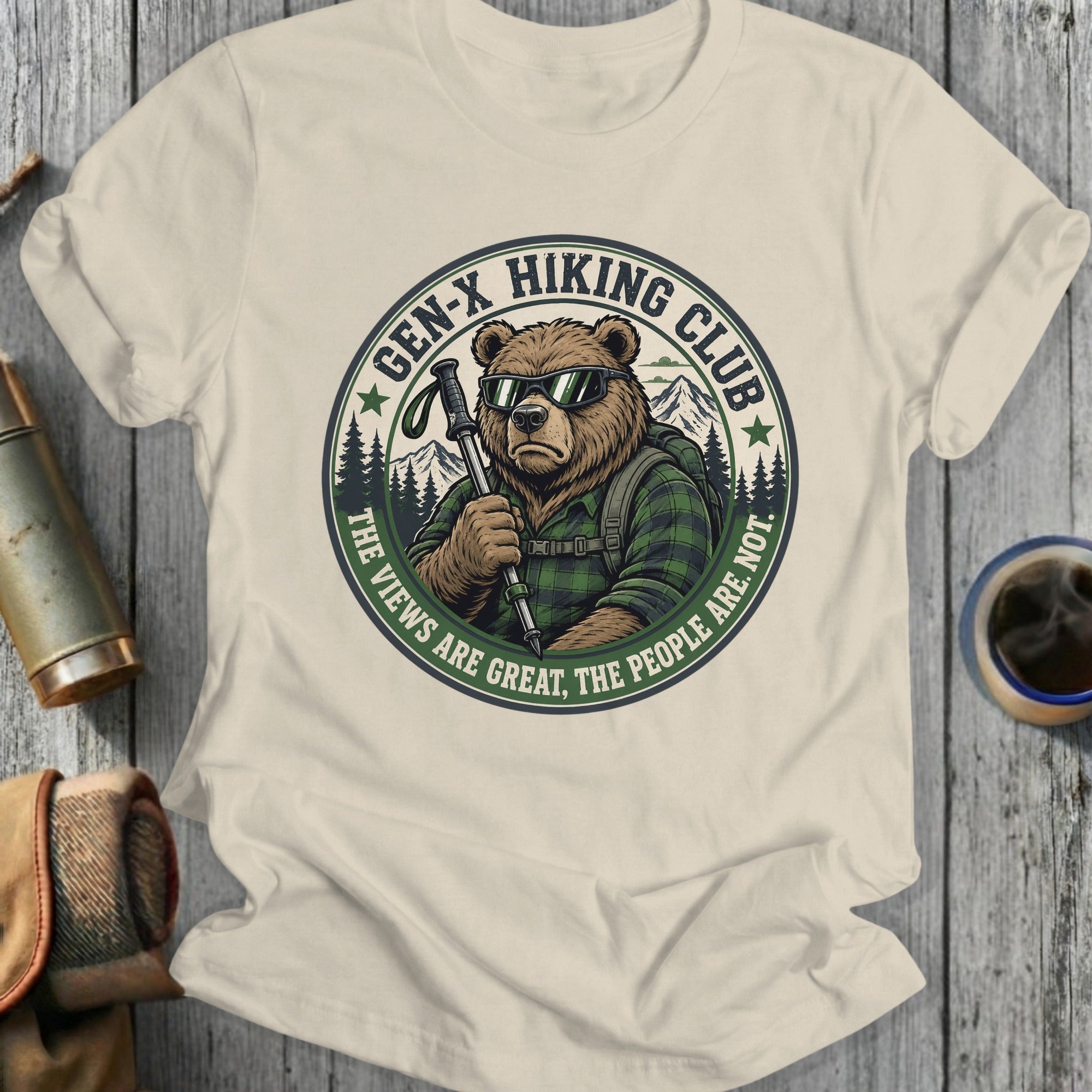 Gen-X Hiking Club bear wearing sunglasses and holding hiking poles.