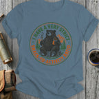 Bear sitting on stump holding chocolate and marshmallow stick with text "I have a very strict snack to activity ratio".