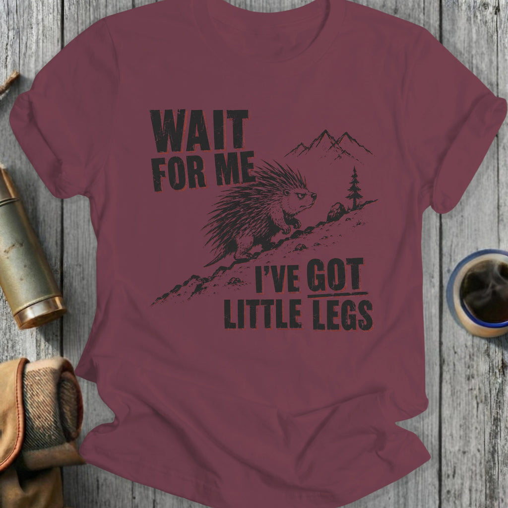 Maroon t-shirt with a porcupine and text "WAIT FOR ME I'VE GOT LITTLE LEGS".
