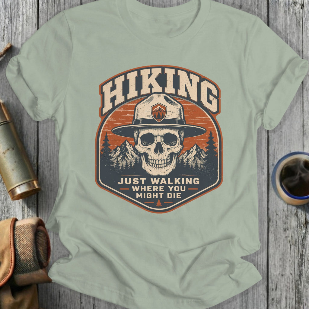 Skull wearing a park ranger hat with "Hiking" and quote.
