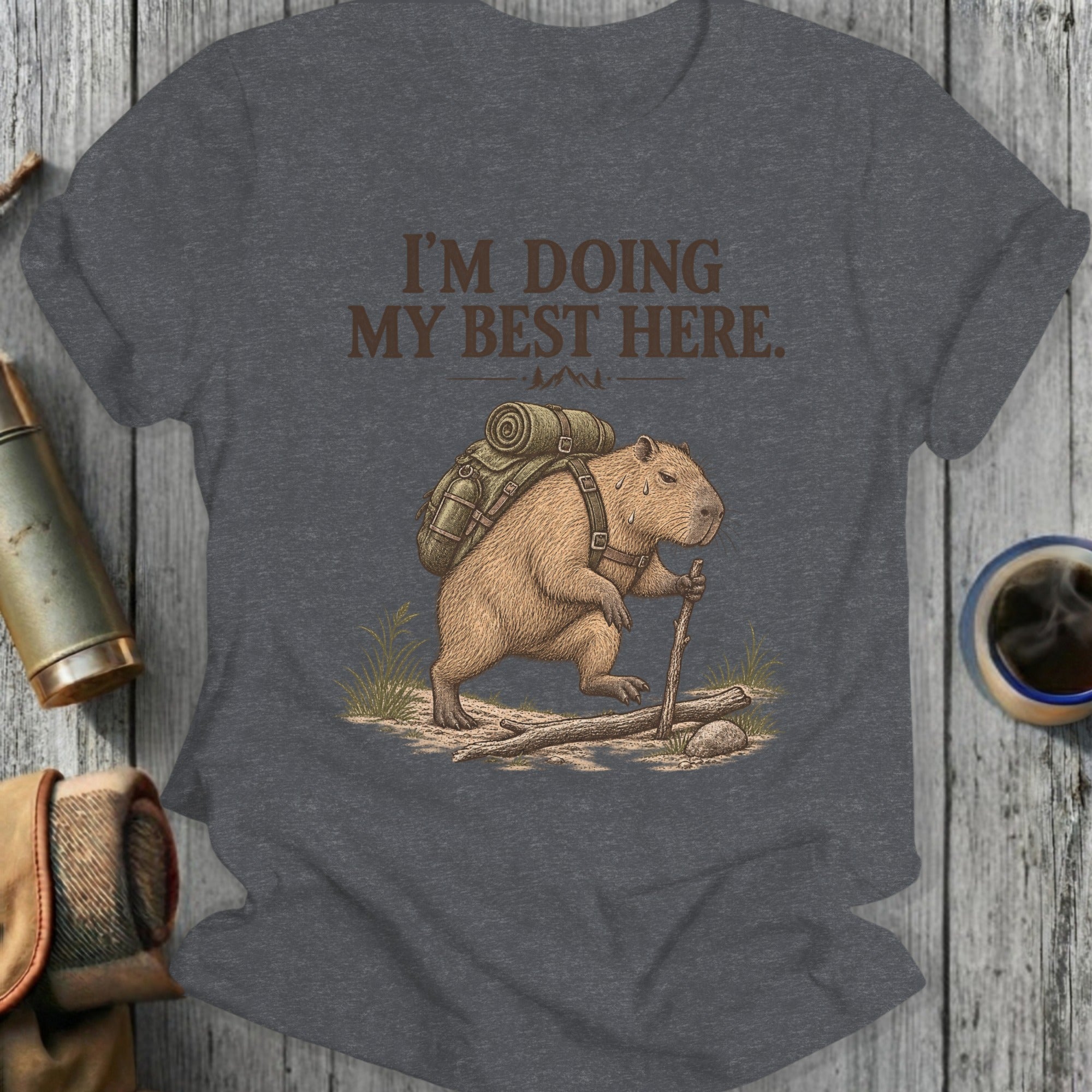 Capybara with backpack hiking, text "I'M DOING MY BEST HERE."