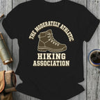 Black t-shirt design with hiking boot, "The Moderately Athletic Hiking Association" text.
