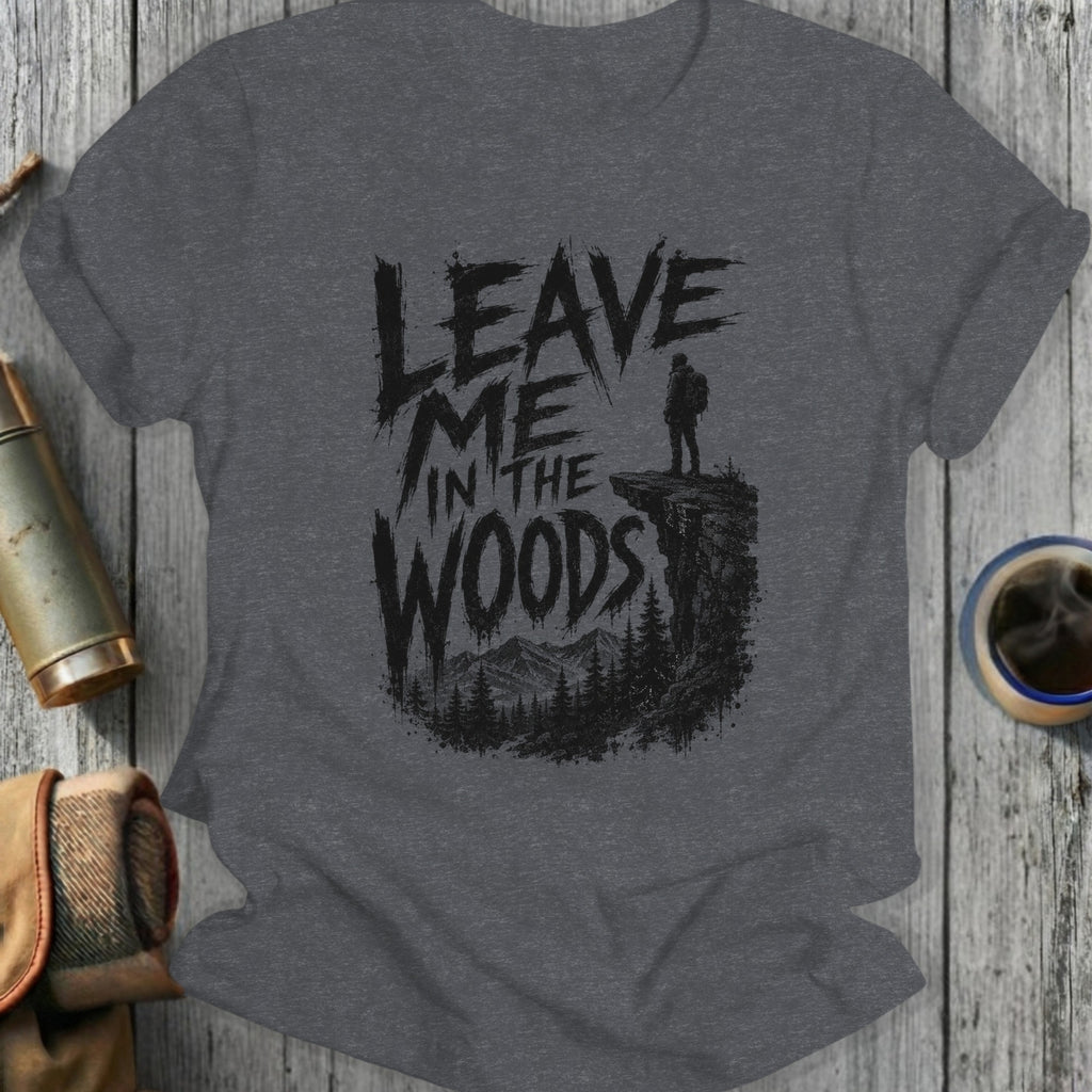 T-shirt with "Leave Me in the Woods" text and hiker silhouette.