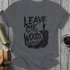 T-shirt with "Leave Me in the Woods" text and hiker silhouette.